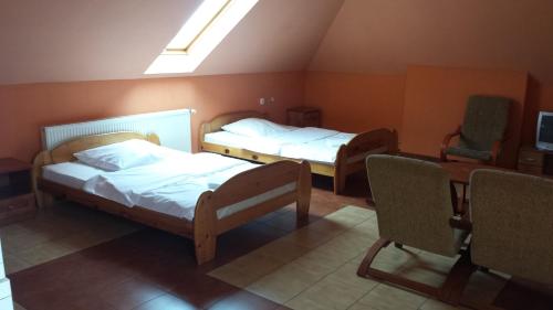 Cama o camas de una habitación en Zajazd Pasja