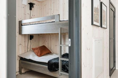 a bunk bed in a tiny house at Charming cottage in Vemdalen near skiing in Vemdalen