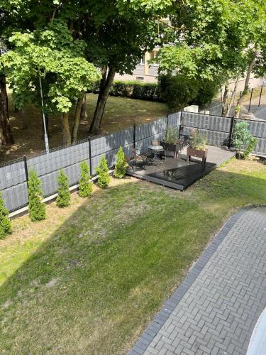 Taman di luar Izabelės apartamentai