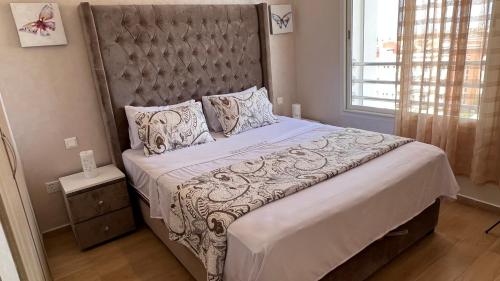 Postel nebo postele na pokoji v ubytování Haut Standing Appartement - Centre Ville Oujda