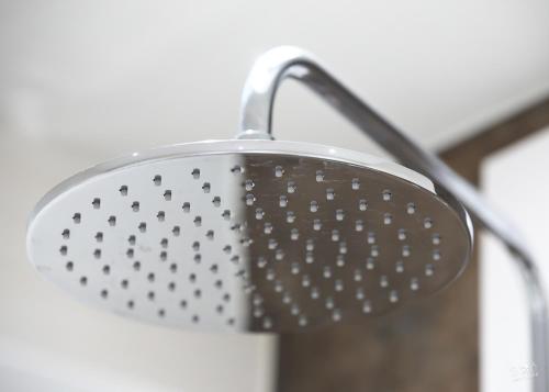 a metal strainer sitting on top of a pot at Landhaus Seppenbauer in Bad Ischl