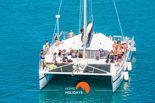 a group of people on a boat in the water at #007 Foxy W by Home Holidays in Albufeira