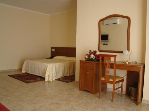 Postel nebo postele na pokoji v ubytování Hotel Ristorante111