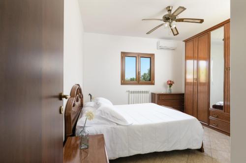 Postel nebo postele na pokoji v ubytování Villa Bella con piscina by Wonderful Italy