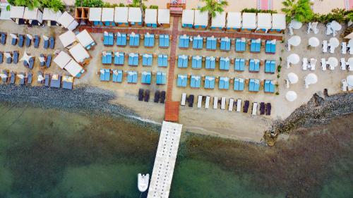 an aerial view of a building next to a body of water at Class Unique Beach in Marmaris