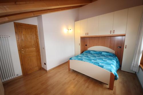 Postel nebo postele na pokoji v ubytování Albergo Diffuso Costauta