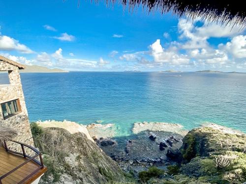 a view of the ocean from a house at The Aerial, BVI in Tortola Island