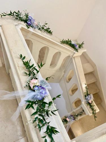 a stair case with flowers on it at Ai Raggi di Sole in Lecce