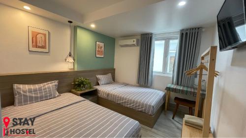STAY hostel 2 - 350m from the ferryにあるベッド