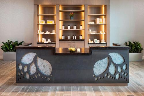a reception counter in a room with a counter top at The Westin Jackson in Jackson