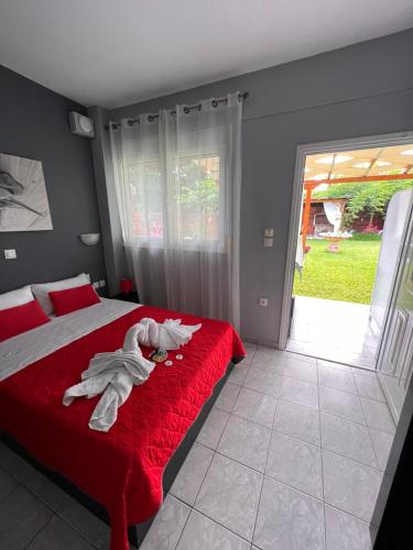 Postel nebo postele na pokoji v ubytování Niriides Rooms