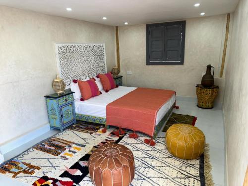 Postel nebo postele na pokoji v ubytování Oasis Merasi Marrakech