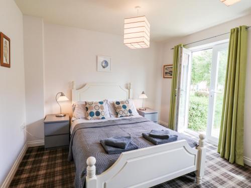 Ένα ή περισσότερα κρεβάτια σε δωμάτιο στο Kittiwakes