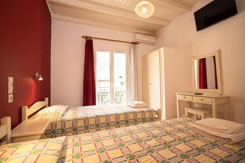 Postel nebo postele na pokoji v ubytování Dragana apartments