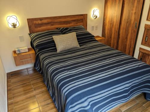 Кровать или кровати в номере Suite Nube, Experiencia Única, Nómadas Digitales, Home Office o Vacacional