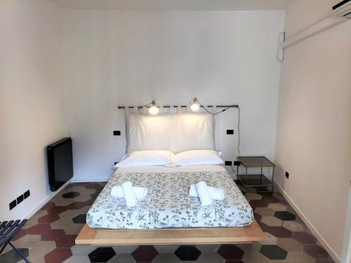 Donizetti Elegant Apartment tesisinde bir odada yatak veya yataklar