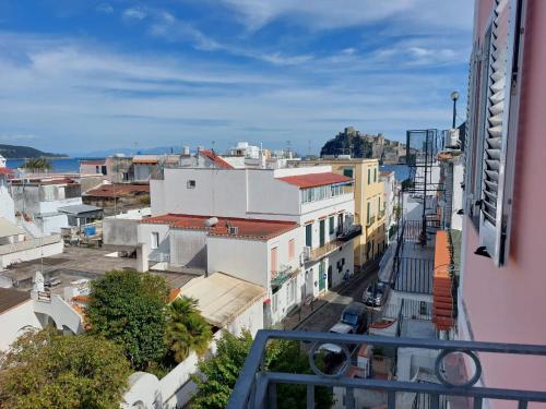a view of a city from a balcony at CASA VACANZE VITTORIA COLONNA in Ischia