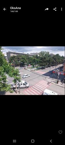 a view of a street with cars on the road at GOAL Apartments 2 in Tbilisi City