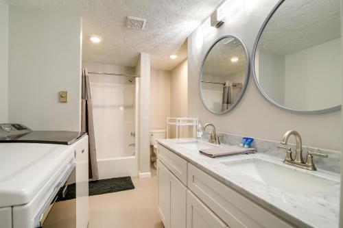 a bathroom with a sink and a mirror at Bayfront Home with Deck - 4 Mi to Downtown Plymouth! in Plymouth