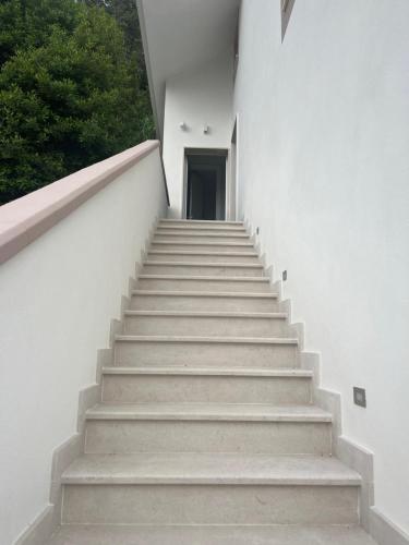 a set of stairs leading up to a building at B&B Vista Mare in Rodi Garganico