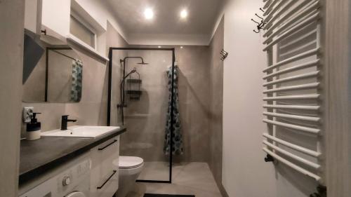 Bathroom sa Apartament Pod Czereśnią