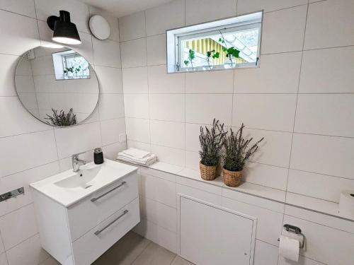 Ένα μπάνιο στο Holiday home HÖLLVIKEN III