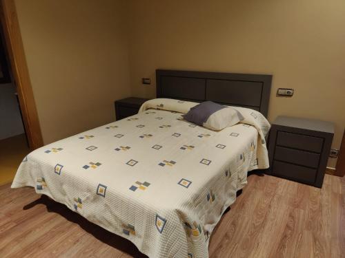 מיטה או מיטות בחדר ב-CASA PEDRASRUBIAS