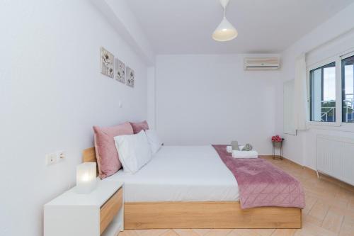 Katil atau katil-katil dalam bilik di Anesis Seaview Apartment
