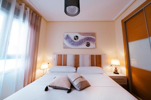 Ένα ή περισσότερα κρεβάτια σε δωμάτιο στο Sol Dénia