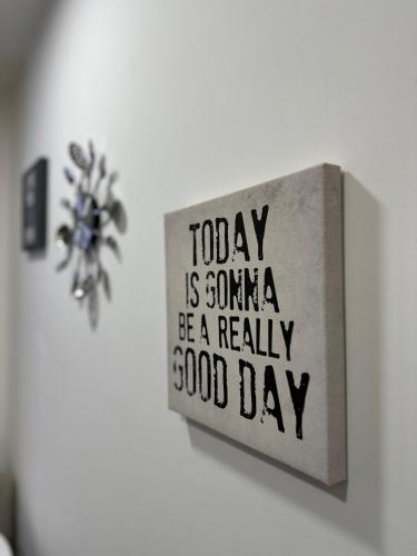 a sign that says today is gonna be a really good day at Apartman AURORA CETINJE in Cetinje