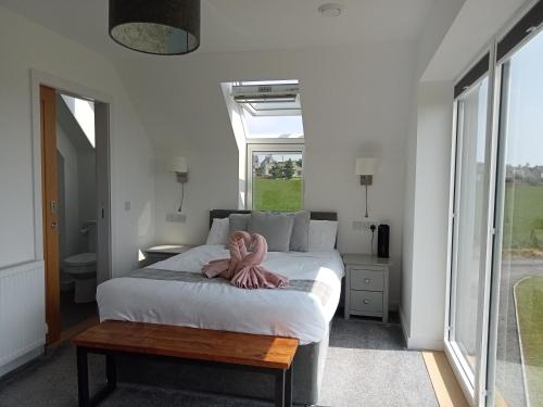 Postel nebo postele na pokoji v ubytování Flotnar Hús - Modern B&B
