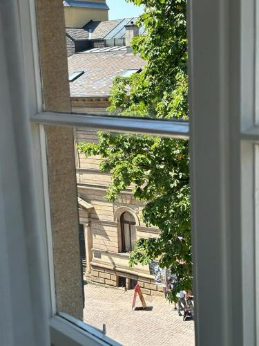 a view of a building from a window at Burgfreiheit in Heidelberg