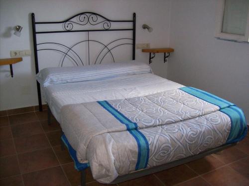 A bed or beds in a room at Casa Trotamundos