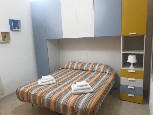 Postel nebo postele na pokoji v ubytování SicilyHouse