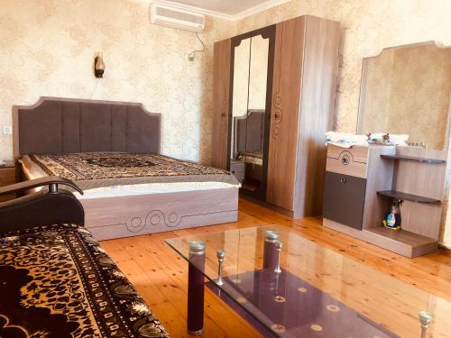 Katil atau katil-katil dalam bilik di Holiday Home cottage with nice Sea View, Zagulba, Baku