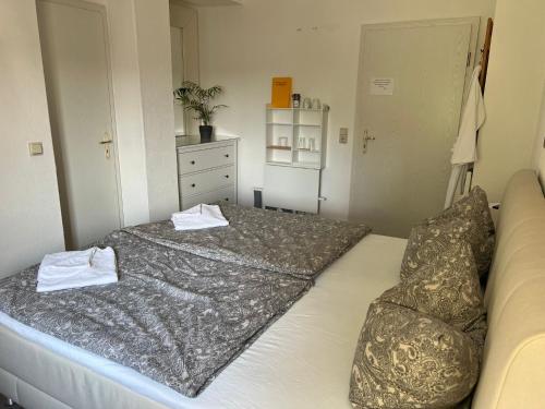 Letto o letti in una camera di Pension Zur Wartburg