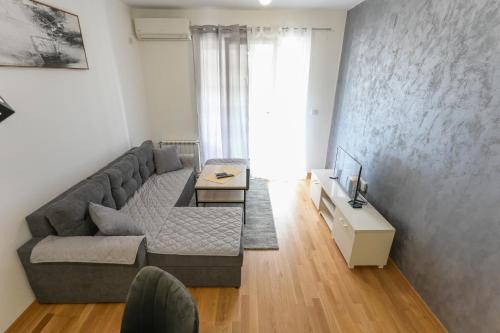 Posezení v ubytování Porta Apartment