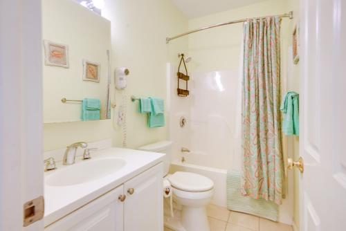 a bathroom with a sink and a toilet and a shower at Sunny Wells Cottage - 1 Mi to Moody Beach! in Wells