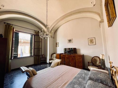 Letto o letti in una camera di Super attico della Brigata Spendereccia!