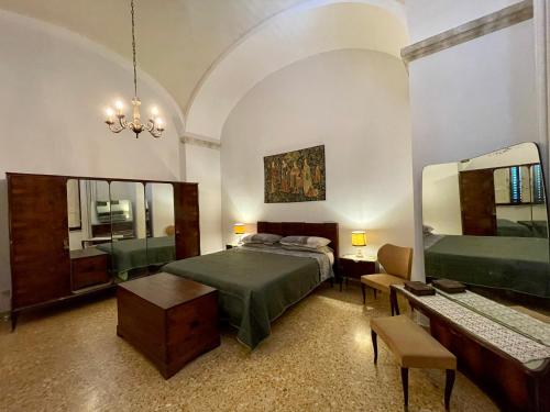 Letto o letti in una camera di Super attico della Brigata Spendereccia!