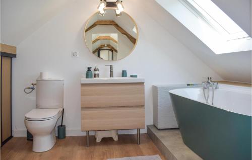 a bathroom with a sink toilet and a mirror at Amazing Home In Le Vieux-bourg With Private Swimming Pool, Can Be Inside Or Outside in Le Vieux-Bourg