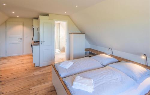 Ένα ή περισσότερα κρεβάτια σε δωμάτιο στο Ferienwohnung Vogelkoje