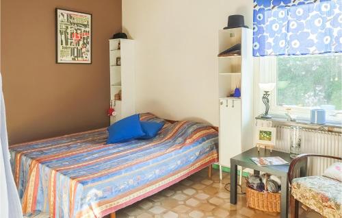 A bed or beds in a room at Amazing Home In Kosta With Wifi