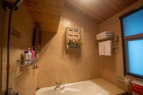 Koupelna v ubytování Floral Hotel · Baihui Living Zhangjiajie
