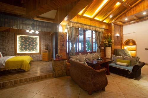 Posezení v ubytování Floral Hotel · Baihui Living Zhangjiajie