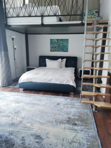 Postel nebo postele na pokoji v ubytování R&B Apartments