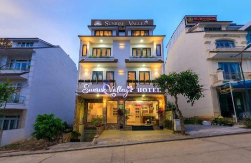 a building with a sign that reads sound laboratory hotel at Sunrise Valley Dalat Hotel in Da Lat