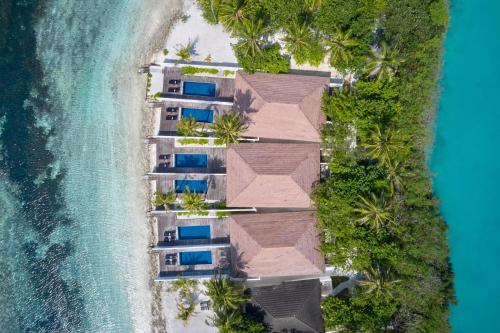an aerial view of a resort on an island at Villa Nautica Paradise Island Resort in North Male Atoll