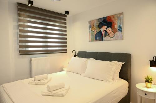 Ένα ή περισσότερα κρεβάτια σε δωμάτιο στο Larisa Hospitality I - Roof Top apartment - with Free Parking