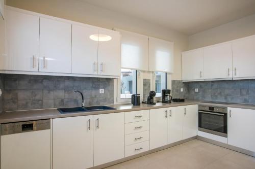 Η κουζίνα ή μικρή κουζίνα στο Villa Ariadne